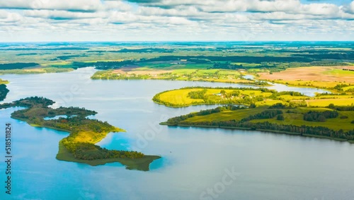 Hyperlapse Timelapse Dronelapse Aerial View Of Villages Houses On Rivers Lakes Islands Summer Day. Top View Of Lake Nature From Attitude. Scenery Scenic Calm Landscape. photo