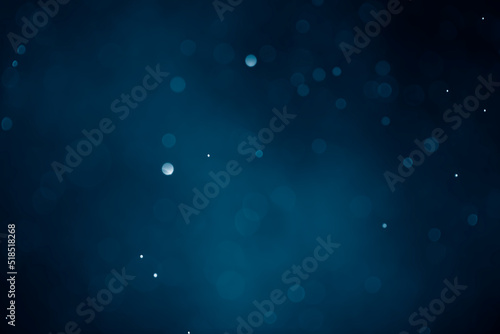 Dark blue navy bokeh glitter background Ideal as wallpaper, banner, Christmas theme, brochure etc.,