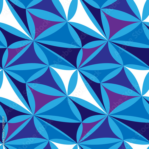 Abstract geometric seamless pattern in purple, blue and white. Flower-like ornament
