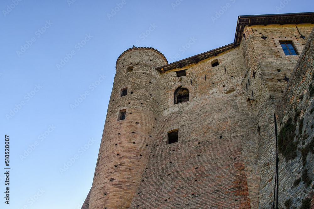 Low-angle view of the medieval castle, characterized by three cylindrical towers, in the Langhe vineyard area, Unesco Site, Castiglione Falletto, Cuneo, Piedmont, Italy