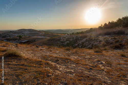 Sunset in the Hebron Mountains in the village of Metar in the northern part of the Negev desert. South of Israel. Soft focus.