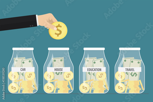 Saving money with various glass jars. Money to spend for home repairs, car payment, education, expenses for travel, and so on. Family budget, money management.