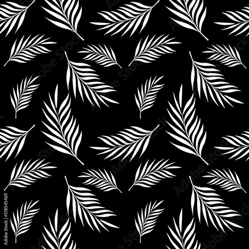 Seamless pattern of white flowers and leaves on black background.