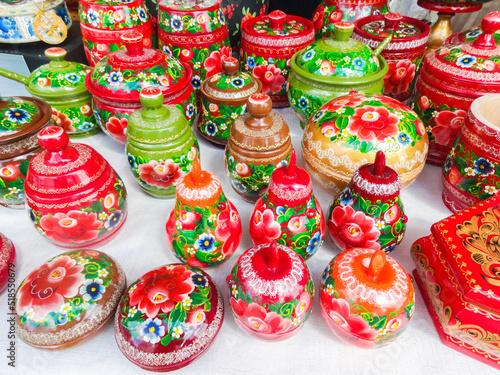 Russian folk crafts - painted wooden jars and caskets