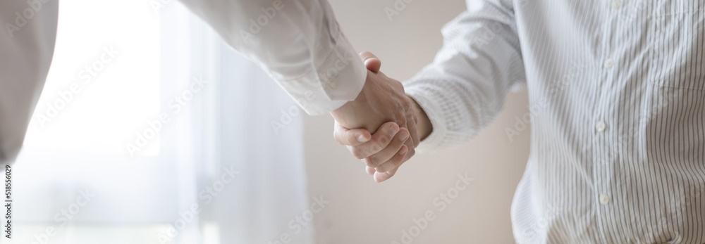 Business success, Real estate agents and customers shake hands to congratulate after signing a contract to buy a house with land and insurance, Acceptance, handshake and agreement concept. Business success, Real estate agents and customers shake hands to congratulate after signing a contract to buy a house with land and insurance, Acceptance, handshake and agreement concept.