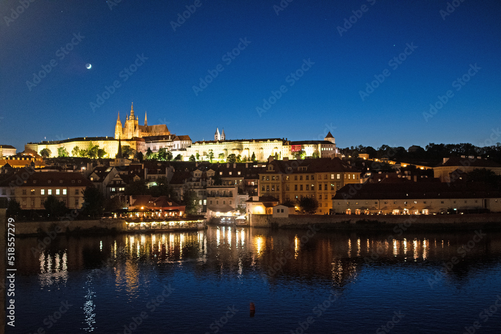 Night time view of Charles Bridge and City Castle, Prague.