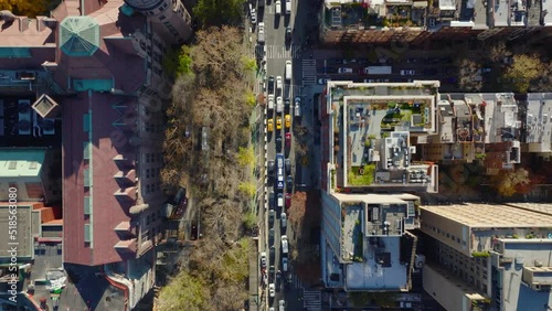 Aerial birds eye overhead top down view of traffic jam in city streets. Clogged road around American Museum of Natural History. Manhattan, New York City, USA
