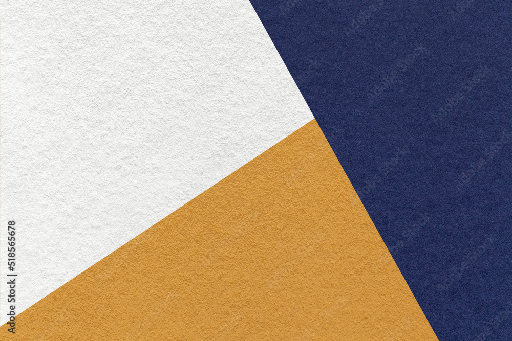Texture of craft navy blue, white and ocher shade color paper background, macro. Vintage abstract indigo cardboard Texture of craft navy blue, white and ocher shade color paper background, macro. Vintage abstract indigo cardboard