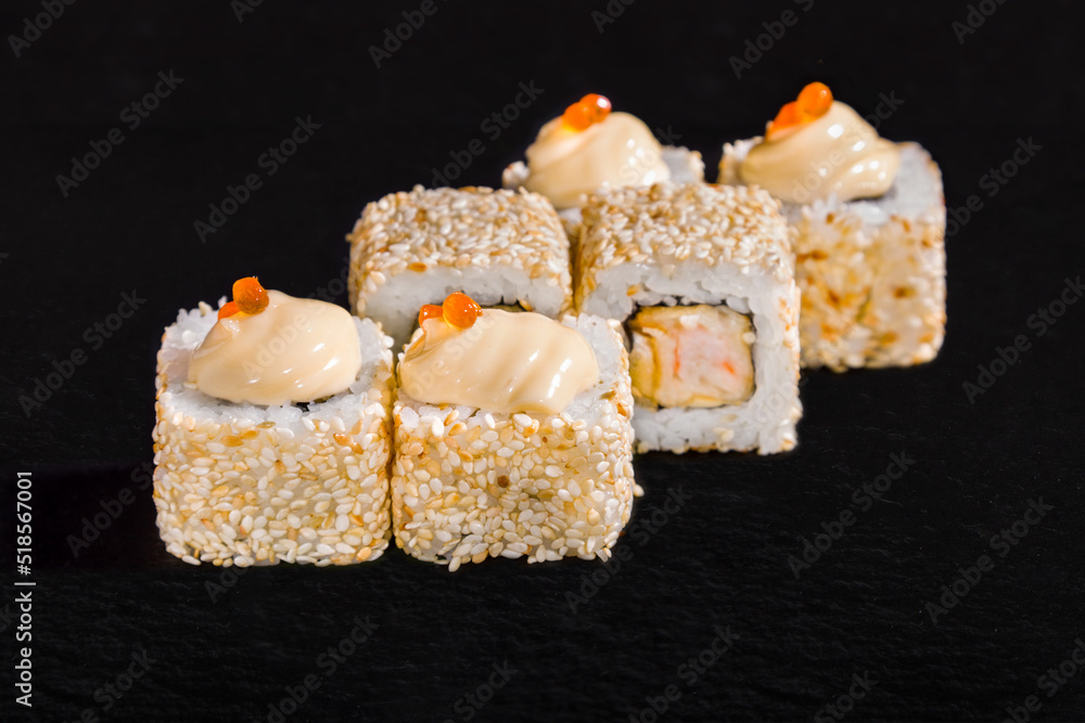Rolls with caviar, rice, mayonnaise, nori, shrimp Rolls with caviar, rice, mayonnaise, nori, shrimp