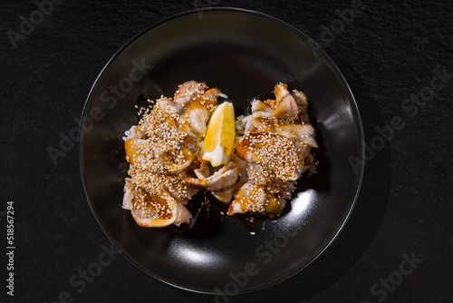 Eel with rice, sesame seeds and lemon