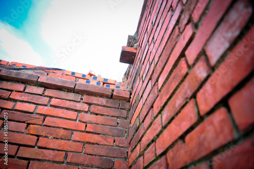 a wall of red bricks