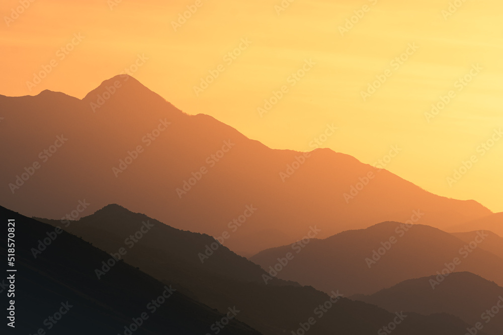 epic sunset above mountain layers in the alps