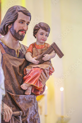 Valokuvatapetti Saint Joseph and Child Jesus catholic religious statue