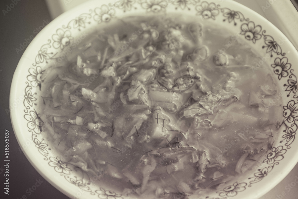 Ukrainian borscht (dish) in a white bowl during the day Ukrainian borscht (dish) in a white bowl during the day