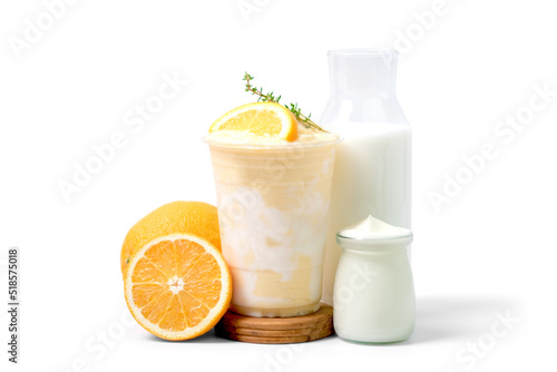 orange yogurt smoothie with orange fruit,yogurt bottle and milk bottle isolated on white background. coffee shop cafe menu concept.