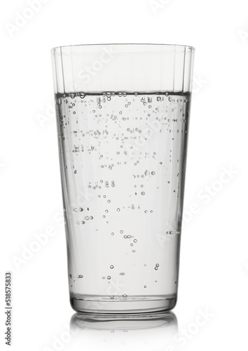 Sparkling mineral water with bubbles on white background. For active lifestyle.