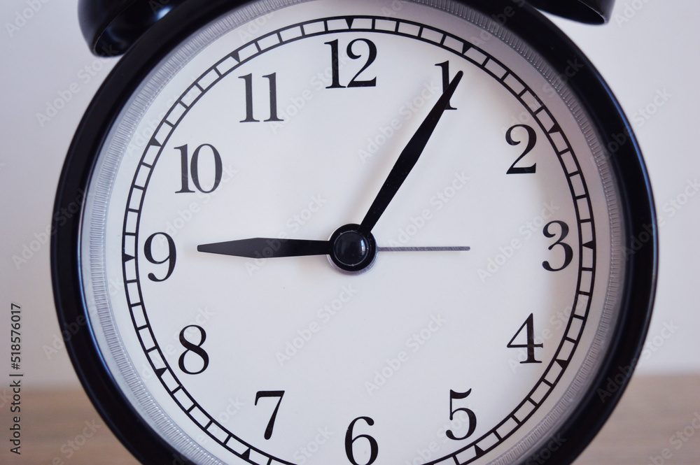 Analog alarm clock pointing at hours, minutes, seconds to display time - Photo of digital timer for website, deadline, illustration, banner, meeting - 9am 9pm day and night time, early, late Analog alarm clock pointing at hours, minutes, seconds to display time - Photo of digital timer for website, deadline, illustration, banner, meeting - 9am 9pm day and night time, early, late
