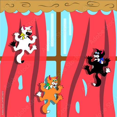 Kittens hanging on the curtain