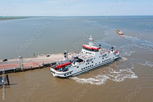 Aerial from the ferry arriving at Holwerd on the Wadden Sea in the Netherlands, photo