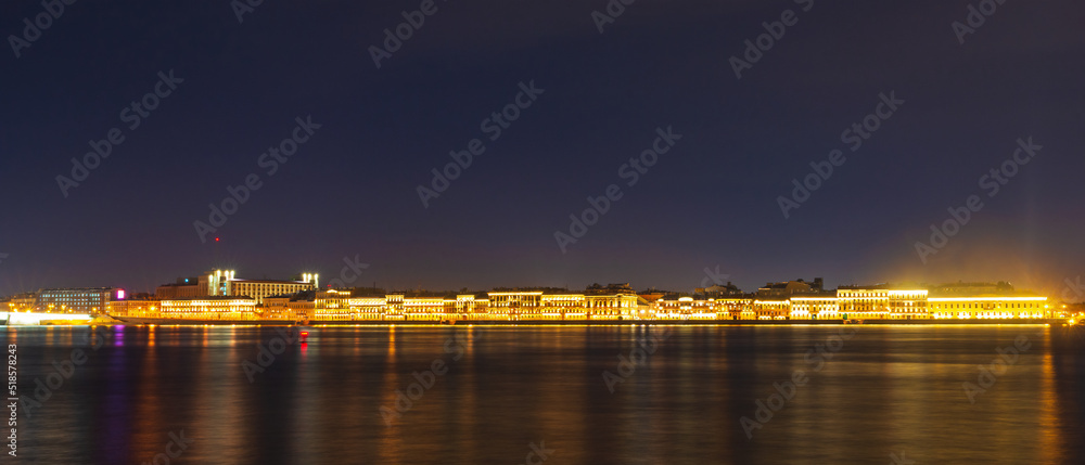 Night panorama of the Neva River and St. Petersburg, Russia. View of Kutuzov Embankment