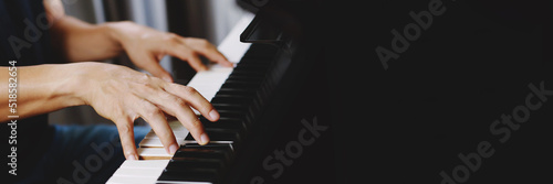 Sticker close up of hand people man musician playing piano keyboard with selective focus keys