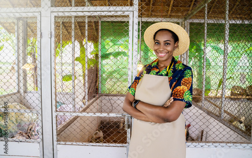 Portrait of happy owner black African american woman working and gardening her farm in summer, sme small business owner of chicken pen farm concept