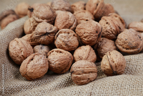 fresh macro walnuts on burlap