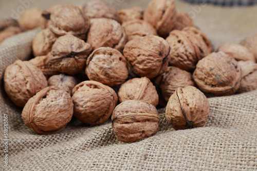 fresh macro walnuts on burlap