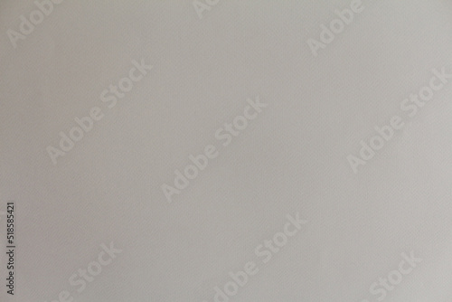 Light grey paper, top view close up. Horizontal sheet of paper, vintage background with beautiful texture.