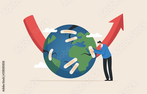 Global Repair. .Restoring the world economy. Solve problems affected by the recession..Businessman repairs a broken globe with economic crisis.