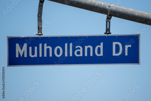 Mulholland Drive Street Sign Against a Clear Blue Sky

