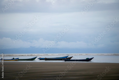 boats on the beach on a grey day © Johanna