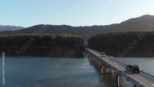 Aerial drone shot of the Wakimachi Sensui Bridge over the Yoshino river. Tokushima island. photo