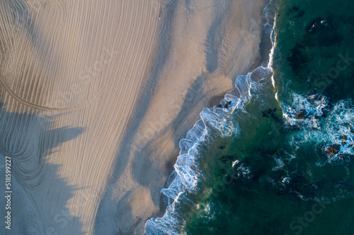 zenithal aerial view of the shore of a beach in the Atlantic ocean © VicVaz
