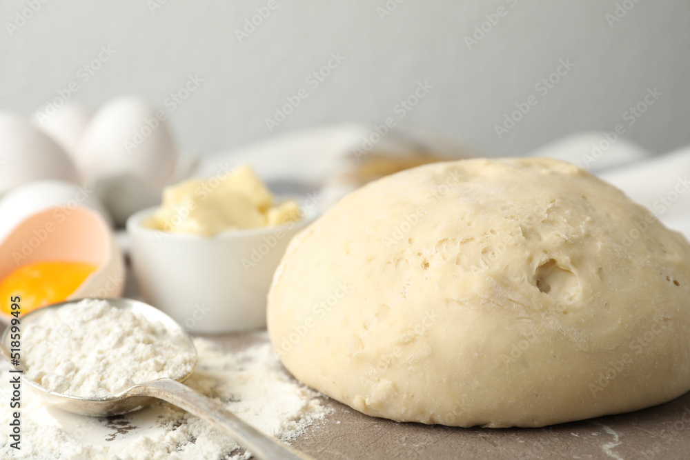 Wheat dough and products on table, closeup. Cooking pastries Wheat dough and products on table, closeup. Cooking pastries