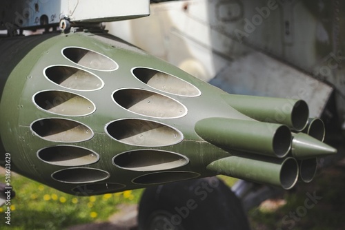 Closeup shot of a rocket pod on a Mi-24 helicopter photo