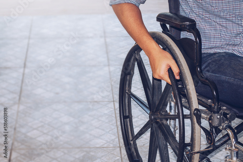 Close up of a man who use a wheelchair at the hospital with copy space