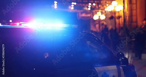 Police vehicle with emergency lights at night photo