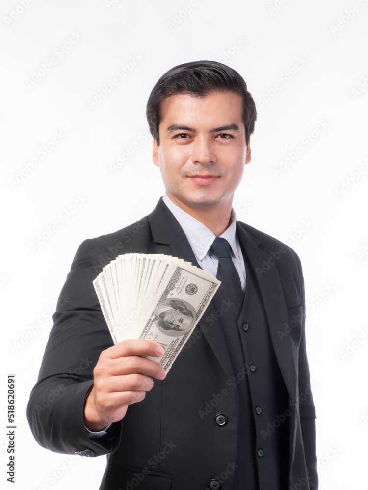 Business rich man trader wear a suit holding money US dollar bills in hand isolated on white background with copy space , concept for rich man business success , business trader concept Business rich man trader wear a suit holding money US dollar bills in hand isolated on white background with copy space , concept for rich man business success , business trader concept