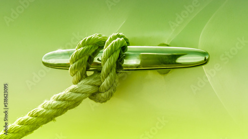 Rope Tied in Loop Around Cleat on a Boat in Lime Green