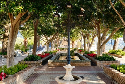 Cuadro en lienzo Empty well-groomed square footpath leading to the rock in Mijas, Costa del Sol,