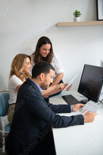 Business team of men and women in an office