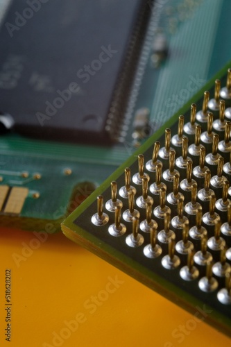 microprocessor on the background of the microcircuit of the motherboard