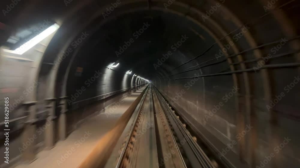 The road in the tunnel from Surrey to Vancouver Canada with slow motion you can see the walls are broken old and dark can be a horror movie. High quality 4k footage The road in the tunnel from Surrey to Vancouver Canada with slow motion you can see the walls are broken old and dark can be a horror movie. High quality 4k footage