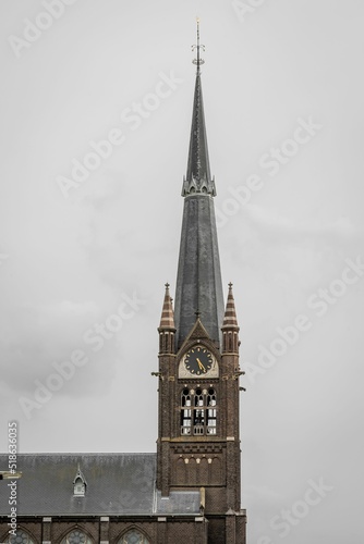 Tower of St. Liduina, a neo-gothic roman catholic church in Schiedam, The Netherlands. photo