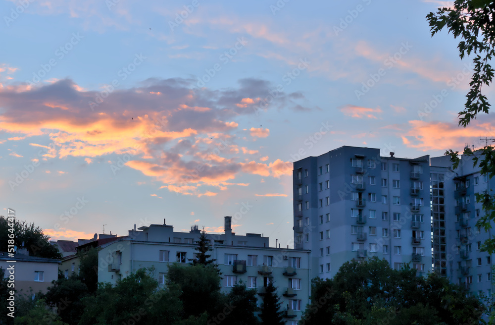 Residential building against the setting sun.
