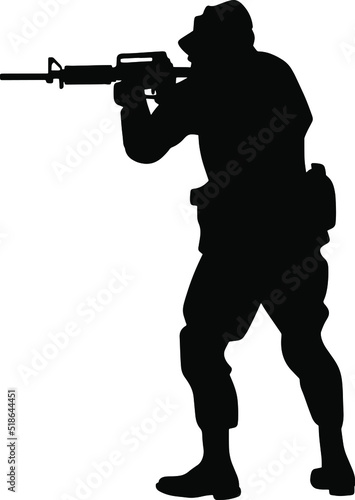 Black and white silhouette of a soldier with a weapon. A special forces soldier aims and shoots a rifle or a machine gun at the enemy