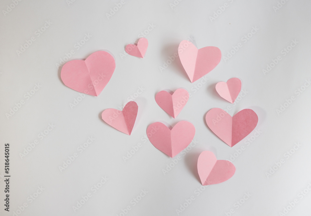 Set of pink hearts on white background