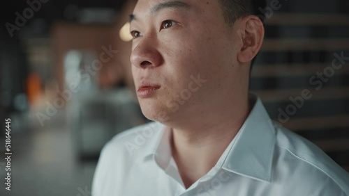 Wallpaper Mural Meditative Asian brunet businessman talking something while standing in the office  Torontodigital.ca