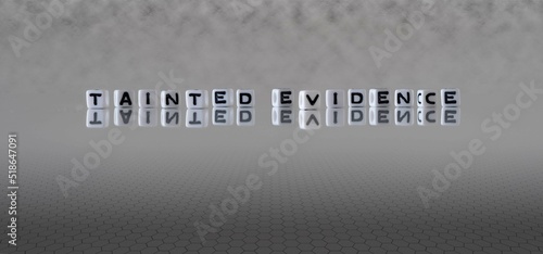 Photography tainted evidence word or concept represented by black and white letter cubes on